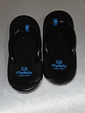 Floaties Sugar Shoes Women's Vintage 90s Black Flip Sandals with Blue Accent